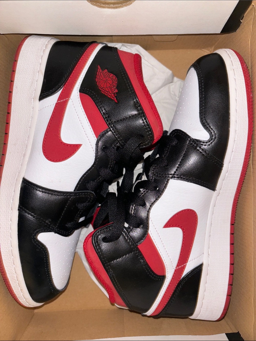 Jordan Men’s High-Top Sneakers in Black, White & Red
